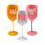 A group of acrylic wine glasses are customized with monograms and custom wording