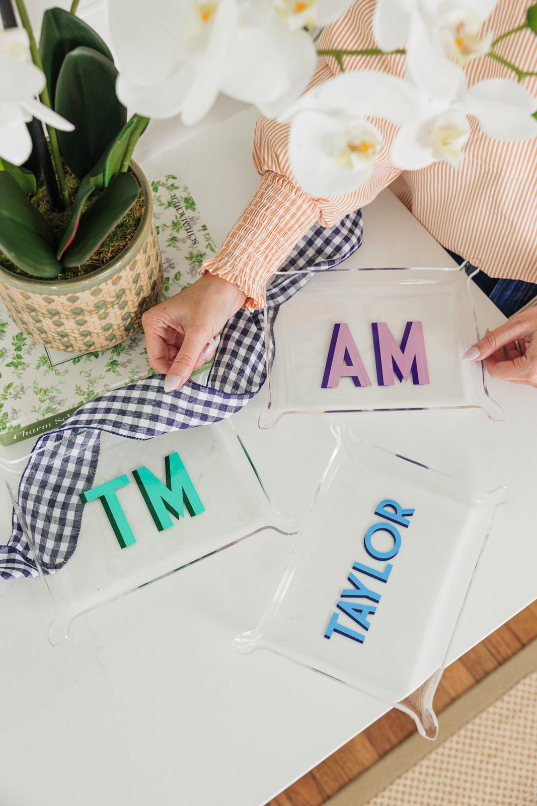 A small and large acrylic tray are personalized with fun color combinations.